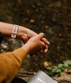 Hands lightly clasped